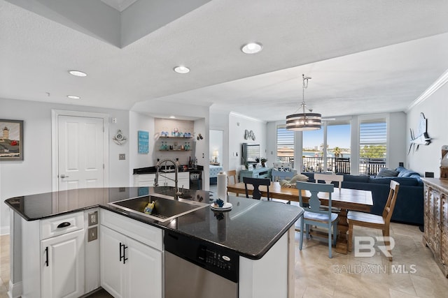 kitchen with a center island, sink, a notable chandelier, white cabinetry, and stainless steel dishwasher