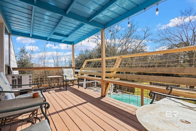 deck with a swimming pool