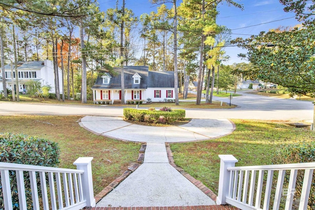 view of front of house with a front lawn