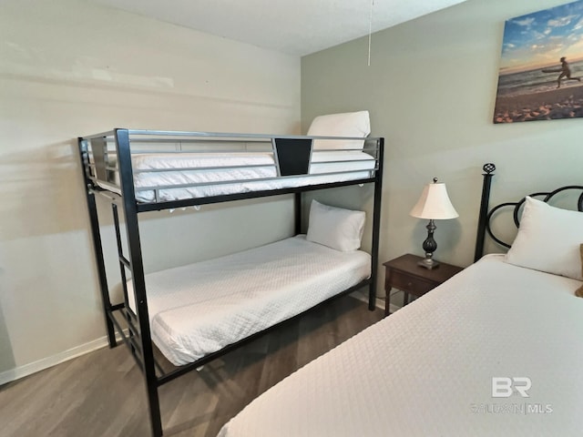 bedroom featuring dark hardwood / wood-style floors