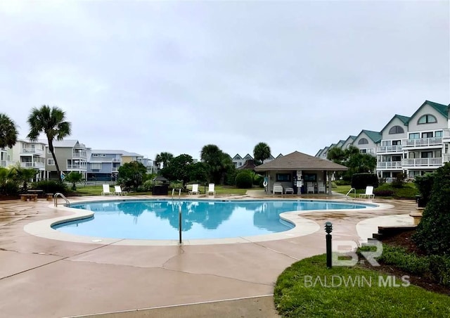 view of pool featuring a patio area