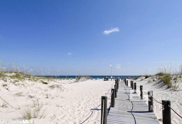 property view of water featuring a view of the beach