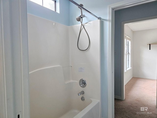 bathroom with tub / shower combination