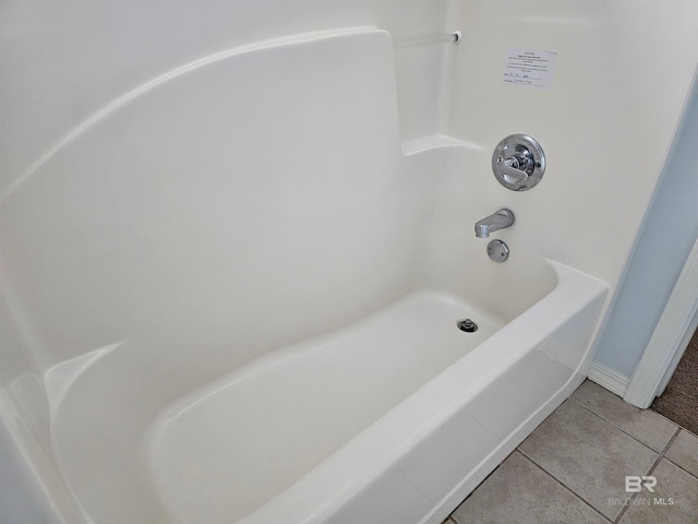 bathroom with tile patterned flooring