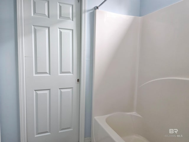 bathroom featuring  shower combination