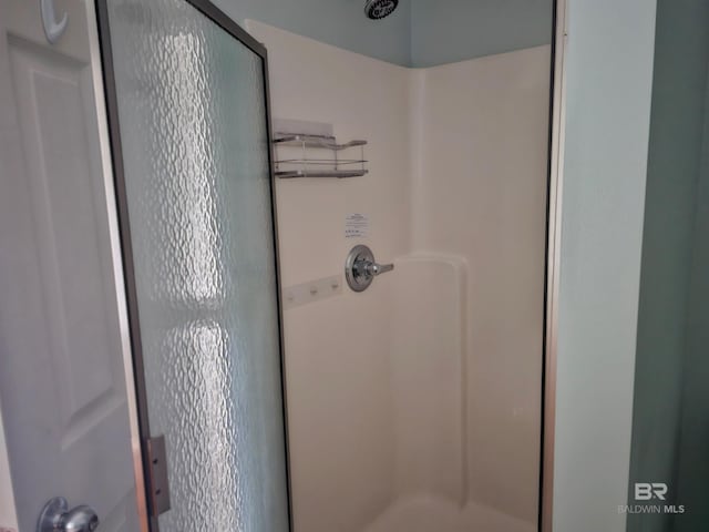 bathroom with walk in shower