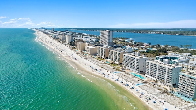 aerial view with a water view, a view of city, and a view of the beach