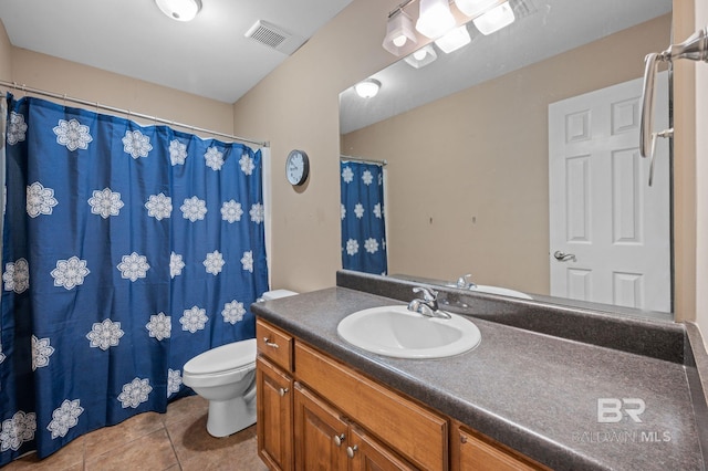 bathroom with tile patterned flooring, toilet, vanity, and a shower with shower curtain