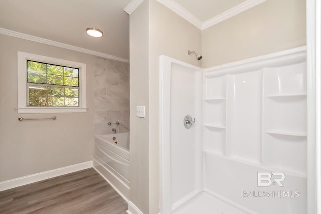 bathroom with baseboards, ornamental molding, walk in shower, and wood finished floors