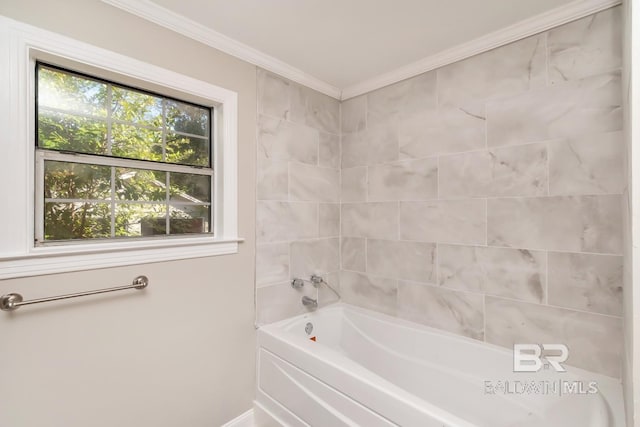 full bath with ornamental molding and bathing tub / shower combination