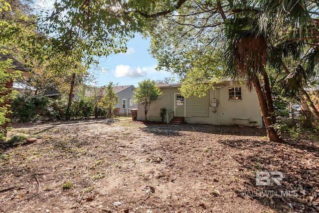 back of property with entry steps