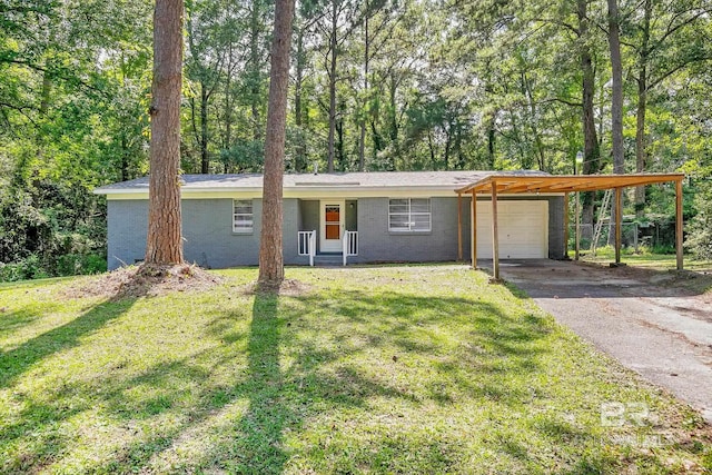 3304 Armond St, Mobile, AL 36605 - ranch-style home with a front lawn, asphalt driveway, brick siding, and an attached garage