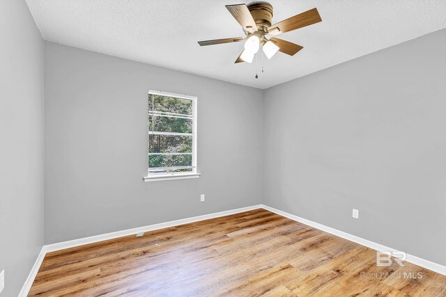 3304 Armond St, Mobile, AL 36605 - unfurnished room featuring wood finished floors and a ceiling fan
