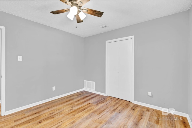 3304 Armond St, Mobile, AL 36605 - unfurnished bedroom with wood finished floors, a closet, and ceiling fan
