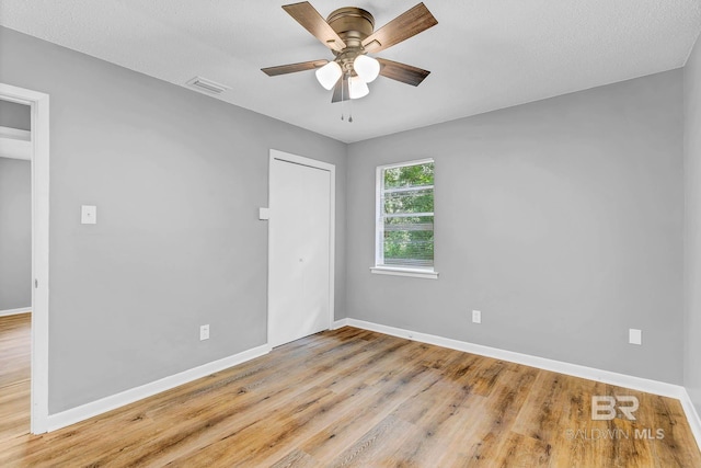 3304 Armond St, Mobile, AL 36605 - empty room featuring light wood-style floors and ceiling fan