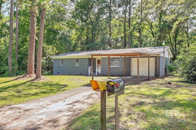 3304 Armond St, Mobile, AL 36605 - ranch-style home with driveway, a garage, a front yard, and brick siding