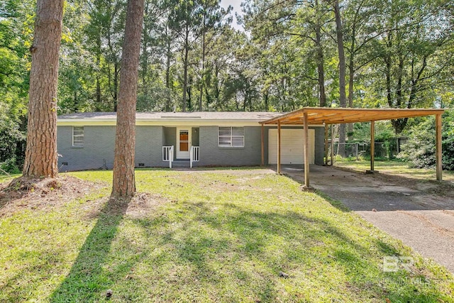 3304 Armond St, Mobile, AL 36605 - view of front facade with crawl space, asphalt driveway, and an attached garage