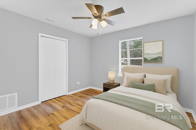 3304 Armond St, Mobile, AL 36605 - bedroom with wood finished floors, a closet, and ceiling fan
