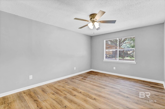 3304 Armond St, Mobile, AL 36605 - unfurnished room featuring a textured ceiling, wood finished floors, and a ceiling fan