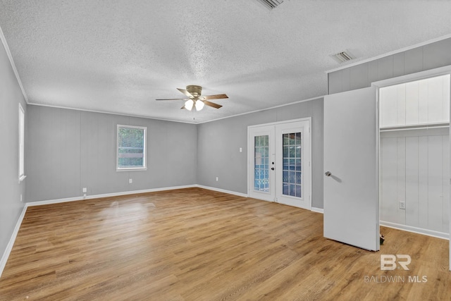 3304 Armond St, Mobile, AL 36605 - unfurnished bedroom featuring light wood finished floors, a textured ceiling, crown molding, ceiling fan, and access to outside