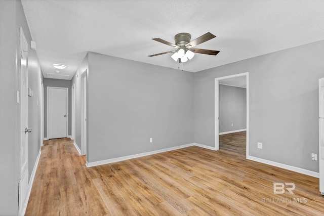 3304 Armond St, Mobile, AL 36605 - spare room featuring ceiling fan, light wood finished floors, and attic access
