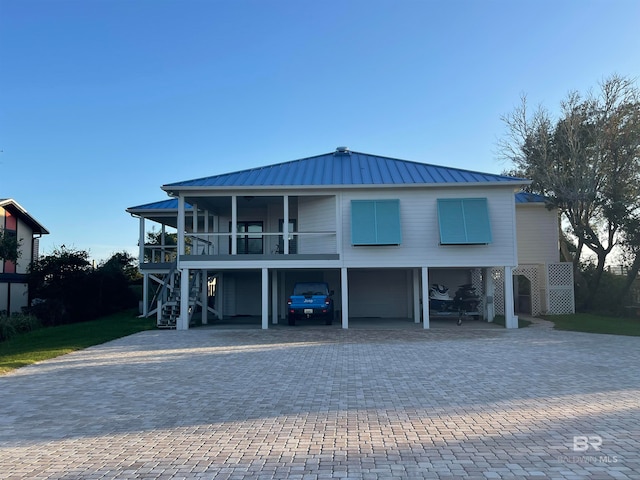 raised beach house with a carport