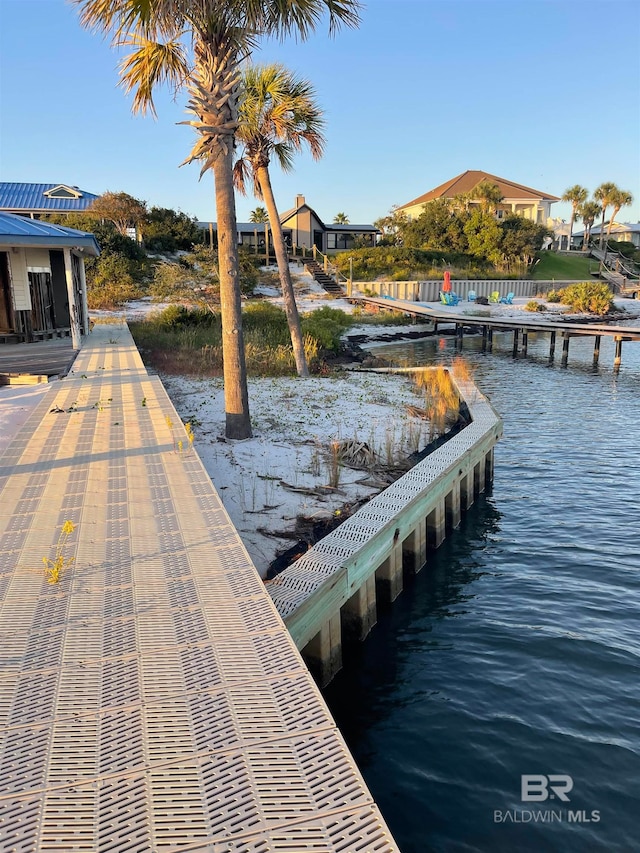 dock area featuring a water view