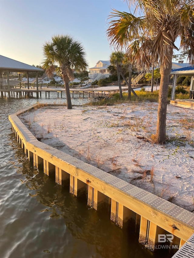 dock area featuring a water view