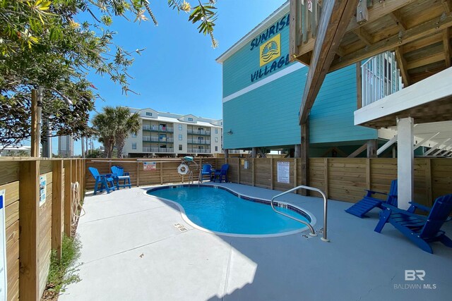 view of pool with a patio