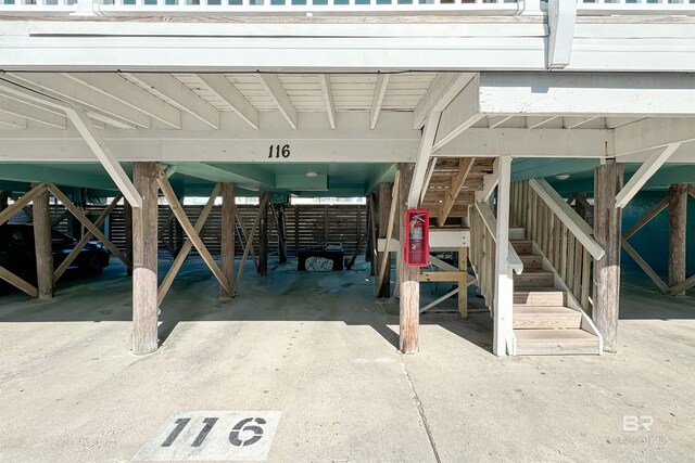 exterior space with a carport