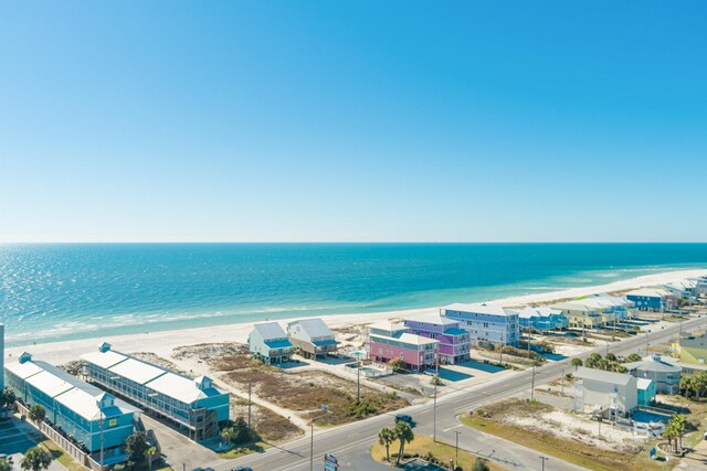 aerial view featuring a beach view and a water view