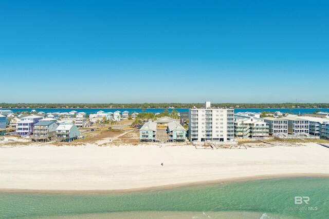 aerial view with a beach view and a water view