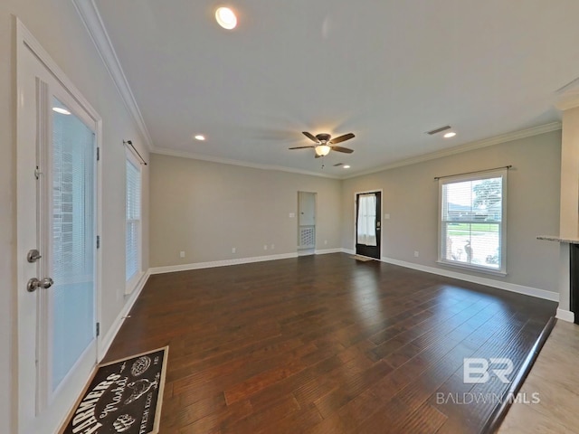 unfurnished living room with dark wood-type flooring, ceiling fan, and ornamental molding