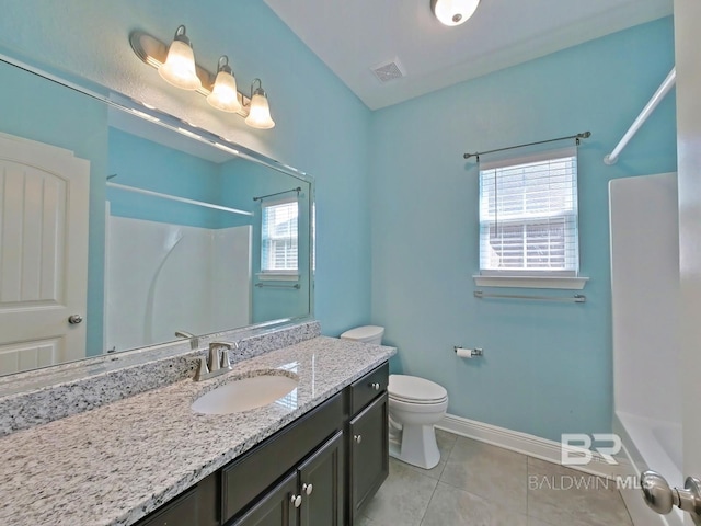 full bathroom featuring tile patterned flooring, vanity, toilet, and shower / bath combination