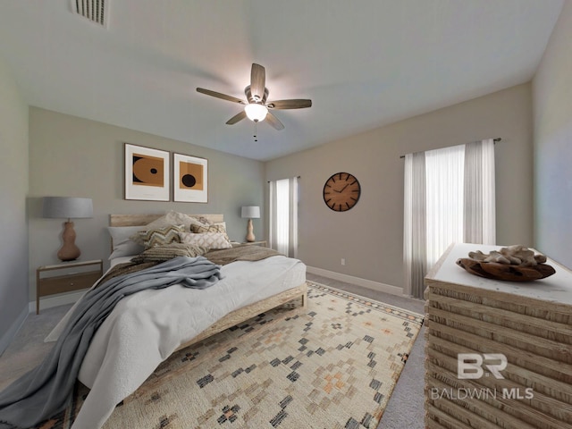 bedroom with light colored carpet and ceiling fan