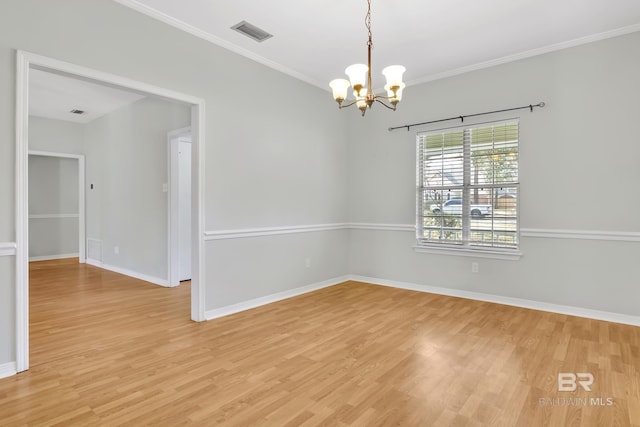 unfurnished room with a chandelier, light wood-style flooring, crown molding, and baseboards