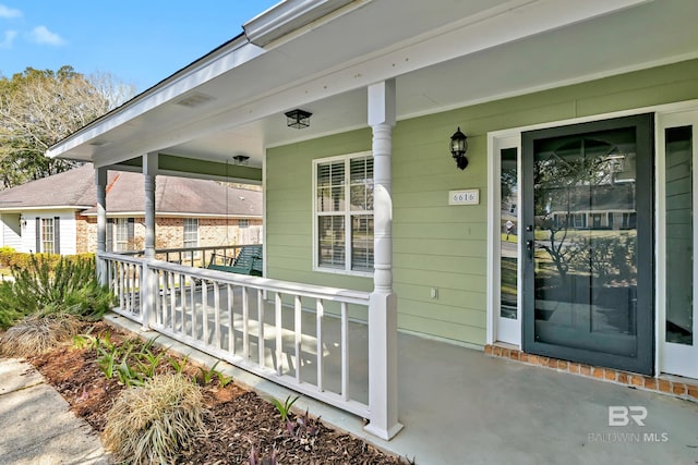 property entrance with a porch