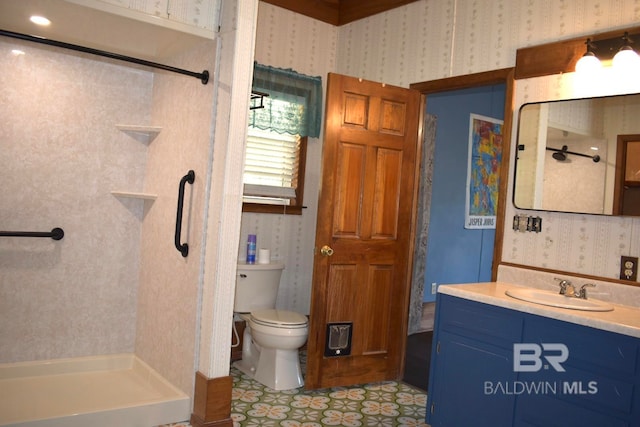 bathroom featuring vanity, toilet, curtained shower, and tile patterned flooring