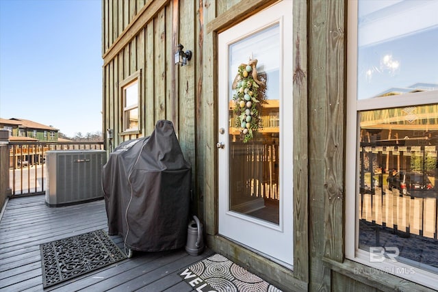 property entrance with central AC unit