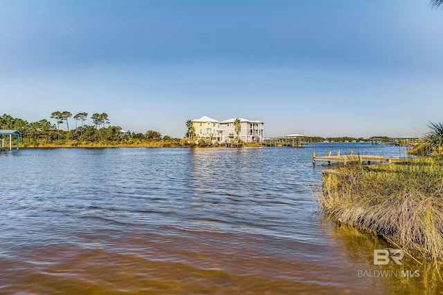 property view of water featuring a boat dock