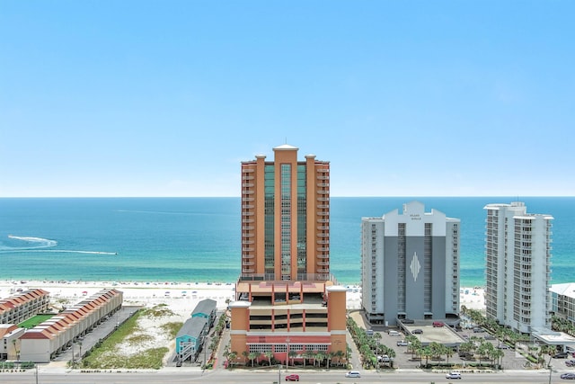 aerial view with a view of the beach and a water view