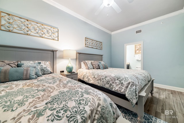 bedroom with wood finished floors, a ceiling fan, visible vents, baseboards, and ornamental molding