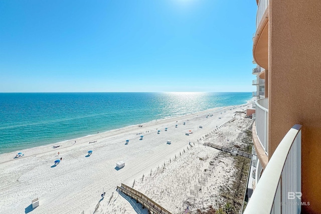 property view of water featuring a beach view