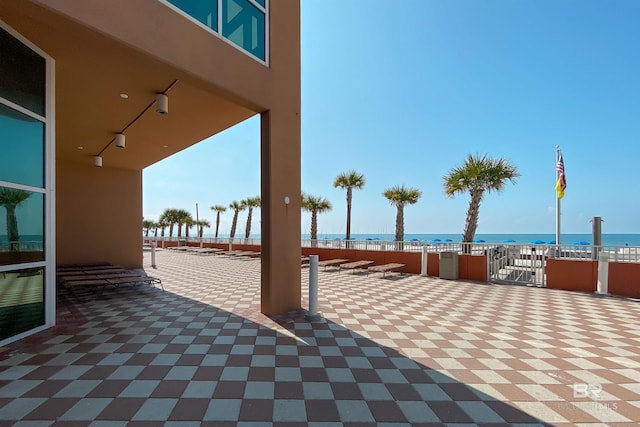 view of patio / terrace with a water view