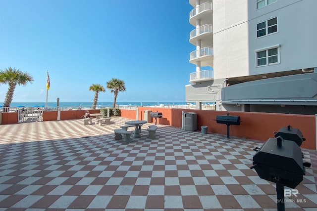 view of patio / terrace featuring a water view