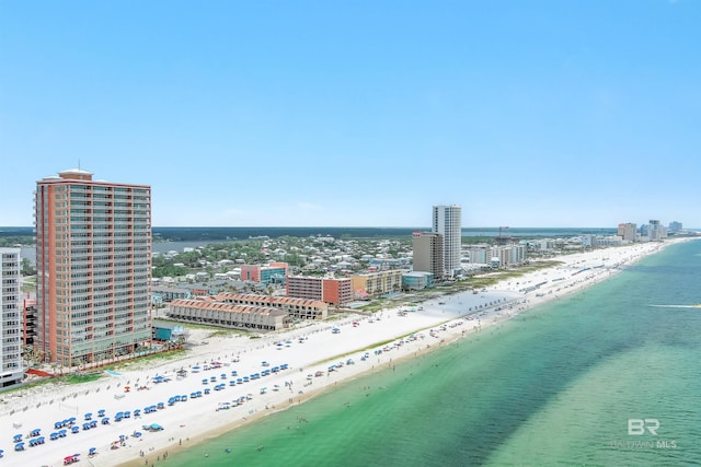 bird's eye view featuring a view of city, a water view, and a view of the beach