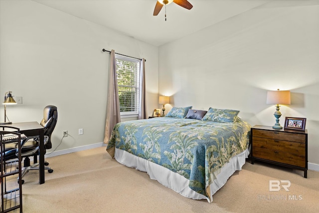 bedroom with ceiling fan and carpet flooring