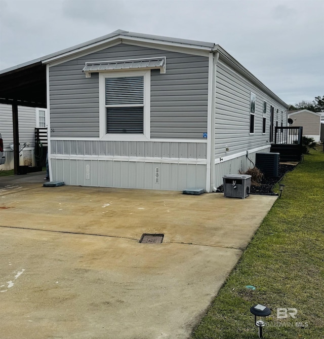 view of property exterior featuring central AC