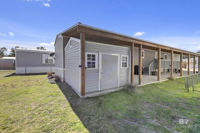 view of outdoor structure with fence