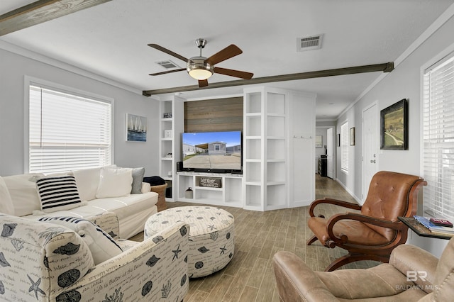 living room featuring a ceiling fan, wood tiled floor, visible vents, and crown molding